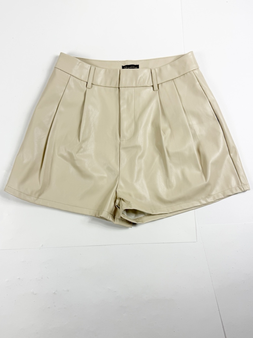 Shinestar Pleated Vegan Leather High-Waist‎ Shorts in Beige Medium